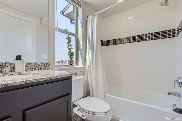 full bathroom with toilet, shower / bath combination with curtain, and vanity