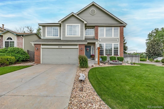 20710 E Princeton Pl, Aurora, CO 80013 - traditional home featuring concrete driveway, brick siding, and a garage