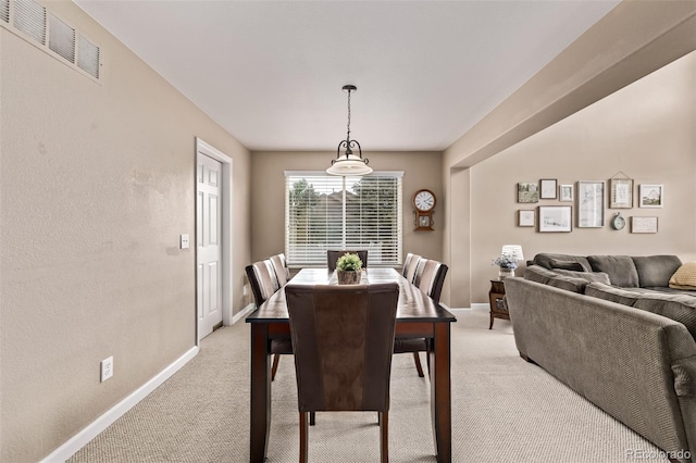 20710 E Princeton Pl, Aurora, CO 80013 - dining room with light carpet and baseboards