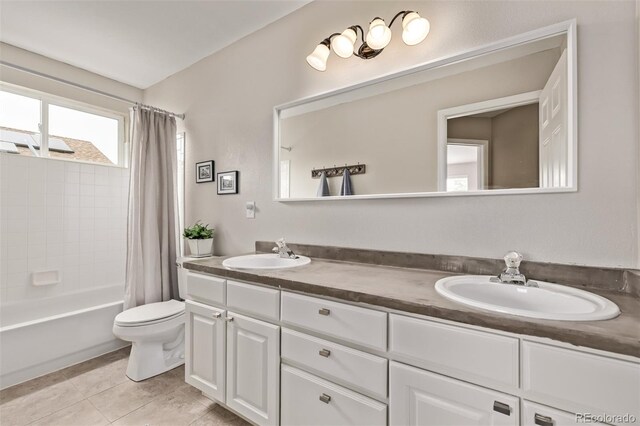 20710 E Princeton Pl, Aurora, CO 80013 - full bath featuring double vanity, shower / bathtub combination with curtain, and tile patterned flooring