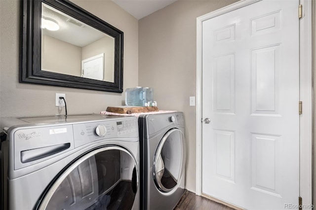 20710 E Princeton Pl, Aurora, CO 80013 - laundry area featuring independent washer and dryer and dark wood-style floors