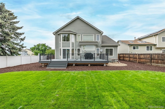 20710 E Princeton Pl, Aurora, CO 80013 - back of property featuring a wooden deck, a fenced backyard, and a shingled roof