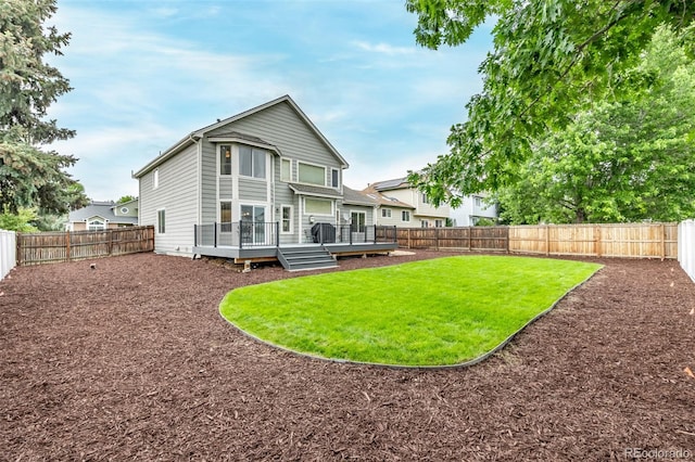 20710 E Princeton Pl, Aurora, CO 80013 - back of house with a fenced backyard and a deck