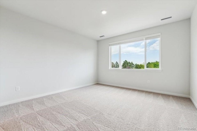 485 Interlocken Blvd Unit 201, Broomfield, CO 80021 - unfurnished room featuring baseboards, carpet floors, and recessed lighting