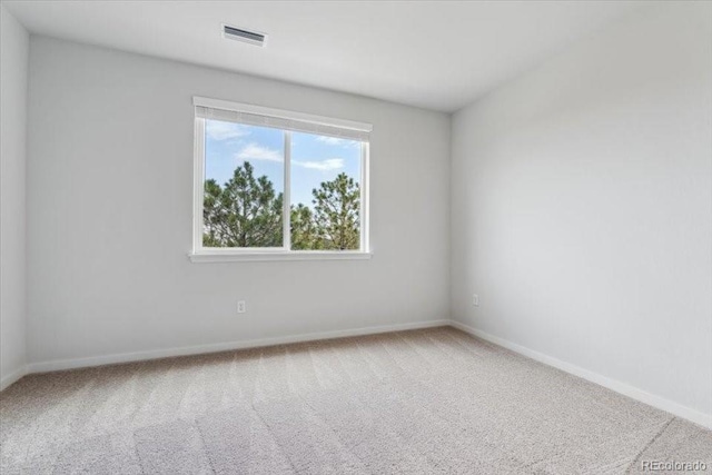485 Interlocken Blvd Unit 201, Broomfield, CO 80021 - spare room featuring carpet flooring and baseboards