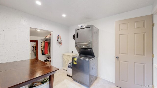 10993 Barker Ave, Conifer, CO 80433 - kitchen featuring stacked washer / dryer and recessed lighting