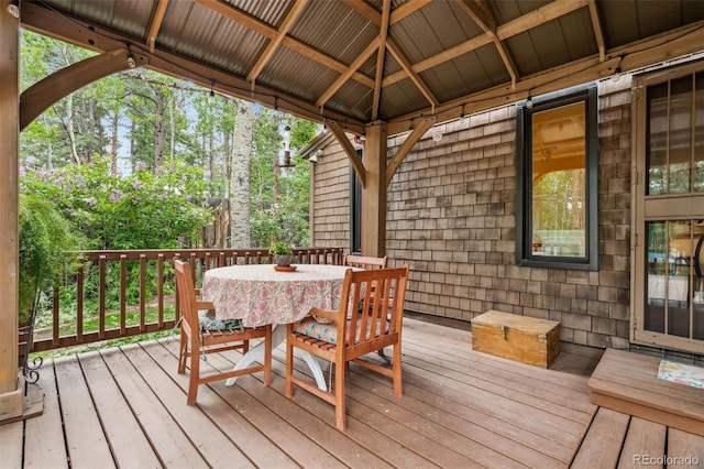 10993 Barker Ave, Conifer, CO 80433 - wooden deck featuring outdoor dining space and a gazebo