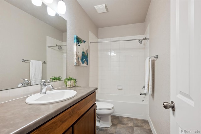 bathroom with shower / bath combination, vanity, toilet, and visible vents