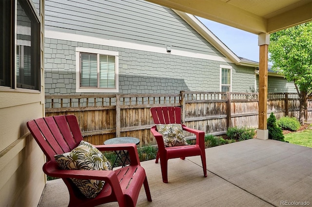 view of patio / terrace with fence