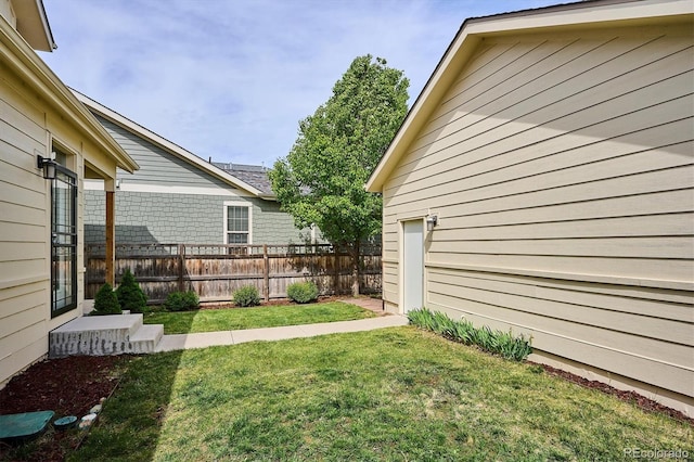 view of yard with fence