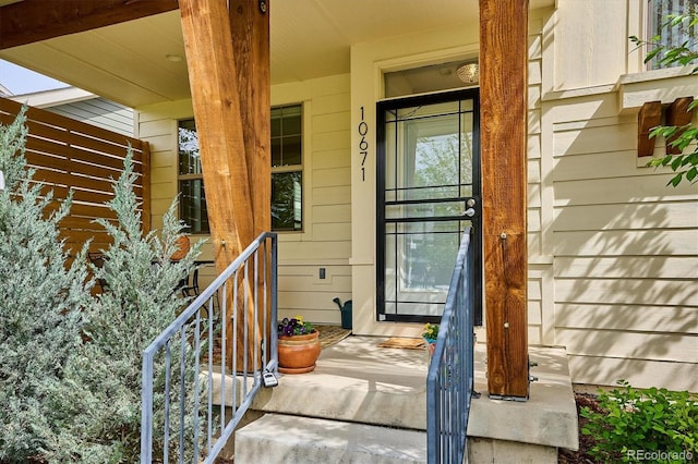 property entrance with covered porch