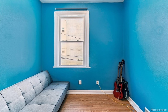 909 W Park Ave, Denver, CO 80205 - living area with wood finished floors and baseboards