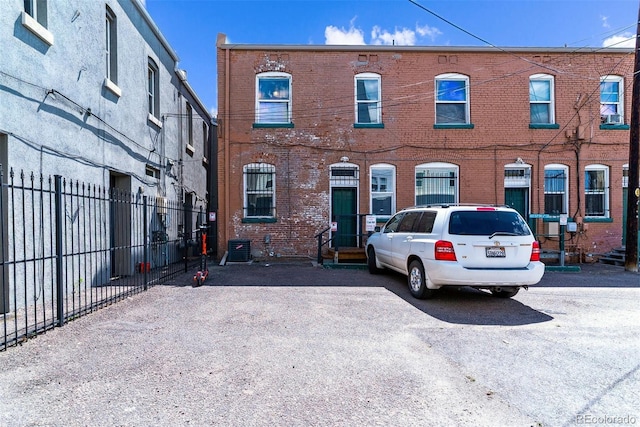 909 W Park Ave, Denver, CO 80205 - townhome / multi-family property featuring brick siding