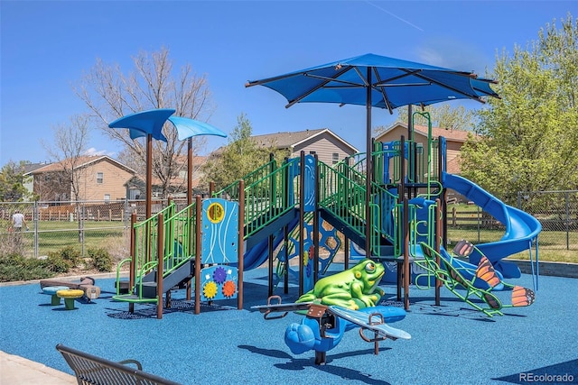 communal playground featuring fence