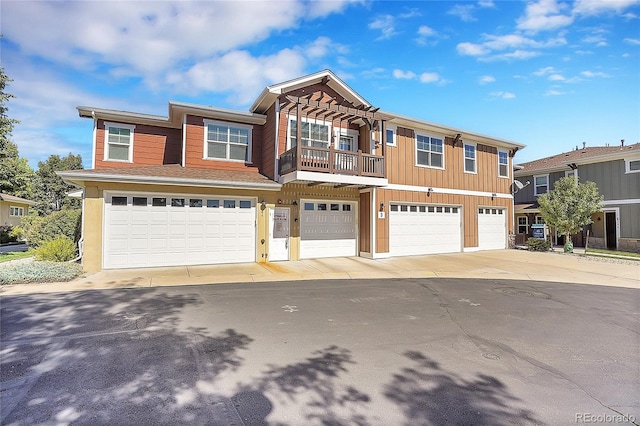 multi unit property featuring a garage