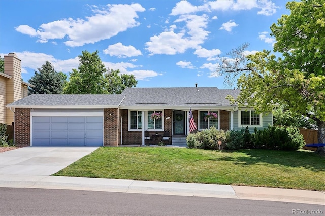 700 Prairie Ridge Rd, Highlands Ranch, CO 80126 - ranch-style home with brick siding, a garage, and driveway