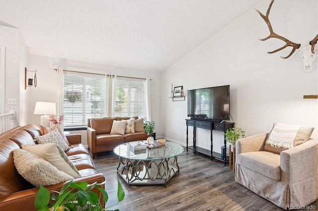 700 Prairie Ridge Rd, Highlands Ranch, CO 80126 - living area featuring wood finished floors and vaulted ceiling
