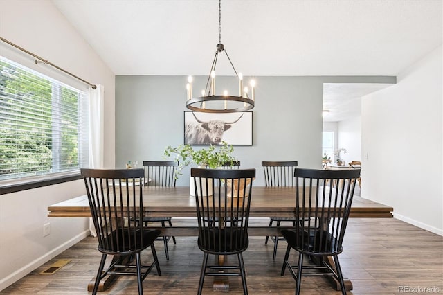 700 Prairie Ridge Rd, Highlands Ranch, CO 80126 - dining room featuring a chandelier and wood finished floors