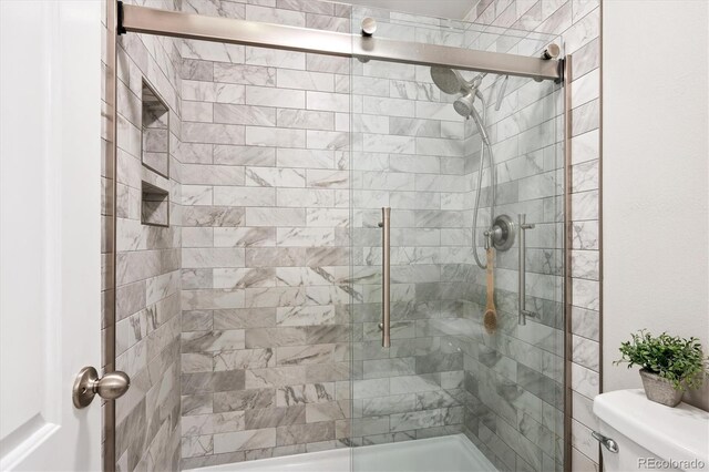 700 Prairie Ridge Rd, Highlands Ranch, CO 80126 - full bathroom with tiled shower