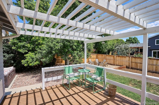 700 Prairie Ridge Rd, Highlands Ranch, CO 80126 - wooden deck featuring a fenced backyard and a pergola