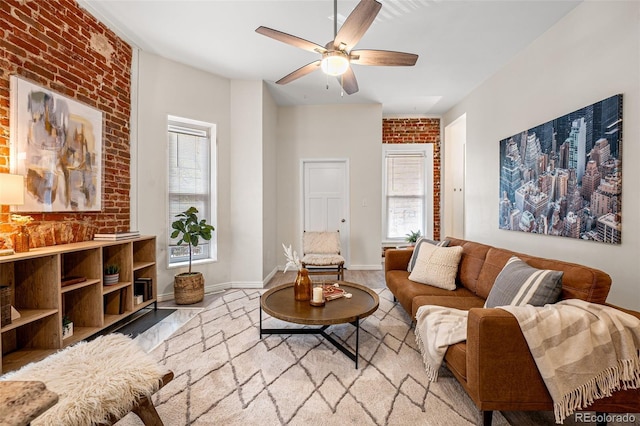 1516 Lafayette St, Denver, CO 80218 - living area featuring ceiling fan and brick wall