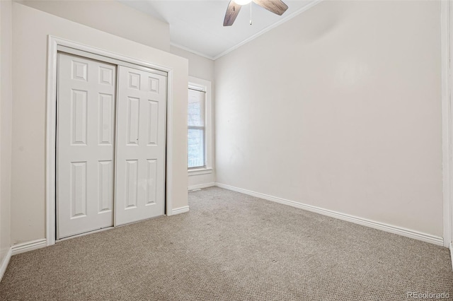 1516 Lafayette St, Denver, CO 80218 - unfurnished bedroom with ornamental molding, carpet floors, baseboards, a closet, and a ceiling fan