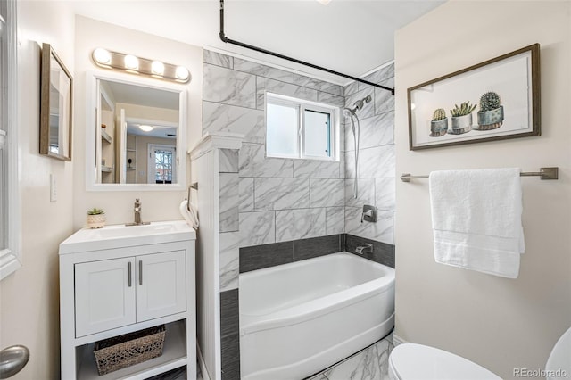 1516 Lafayette St, Denver, CO 80218 - full bath with marble finish floors, toilet, shower / bath combination, and vanity