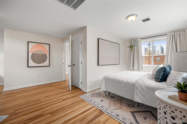 1516 Lafayette St, Denver, CO 80218 - bedroom with light wood-type flooring and baseboards