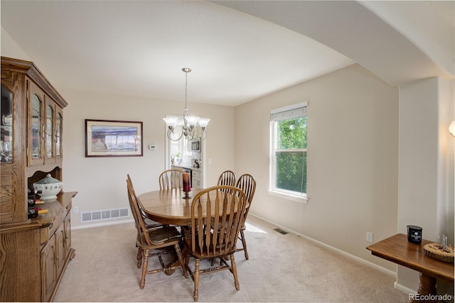 15432 Greenstone Cir, Parker, CO 80134 - dining room with light carpet and a chandelier