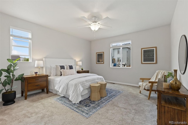 113 Marlowe Dr, Erie, CO 80516 - bedroom featuring light carpet, baseboards, and ceiling fan