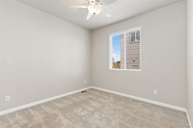 113 Marlowe Dr, Erie, CO 80516 - spare room featuring baseboards, light carpet, and a ceiling fan