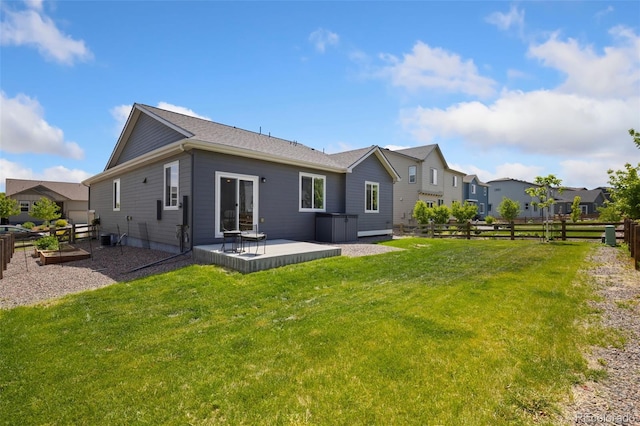 113 Marlowe Dr, Erie, CO 80516 - back of property with a patio and a residential view