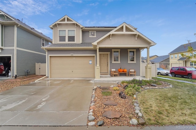 view of front facade featuring a front yard and a garage