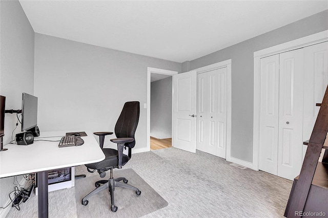 office with light colored carpet