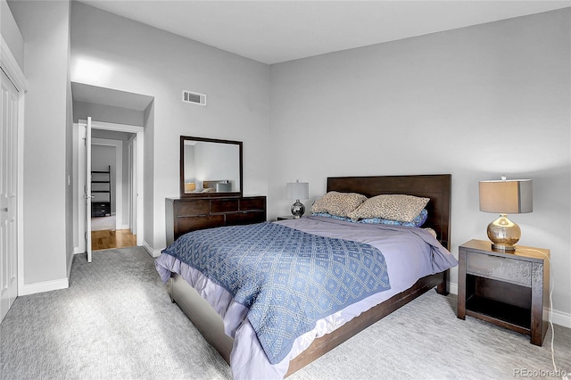 bedroom featuring carpet