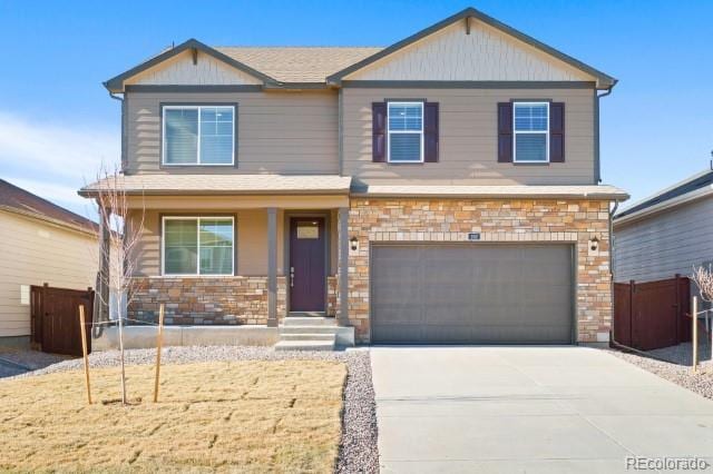 view of front of property with a garage