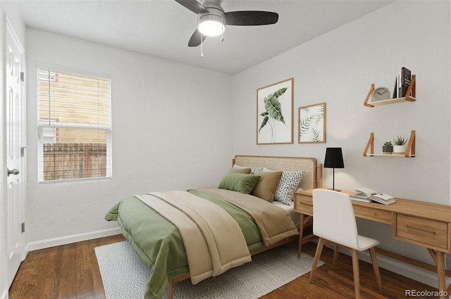 1414 W Nevada Pl, Denver, CO 80223 - bedroom with wood finished floors, baseboards, a desk, and ceiling fan