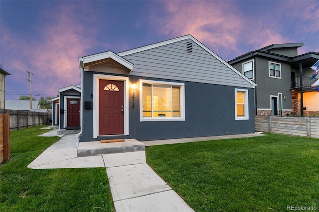 1414 W Nevada Pl, Denver, CO 80223 - view of front of property featuring stucco siding