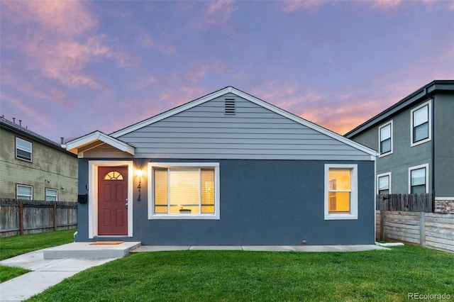 1414 W Nevada Pl, Denver, CO 80223 - view of front facade featuring stucco siding