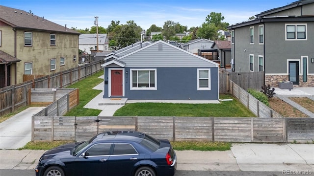 1414 W Nevada Pl, Denver, CO 80223 - view of front of house featuring stucco siding