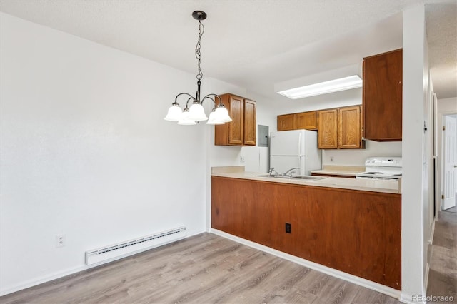 kitchen featuring a baseboard radiator, white appliances, brown cabinetry, and light wood-type flooring