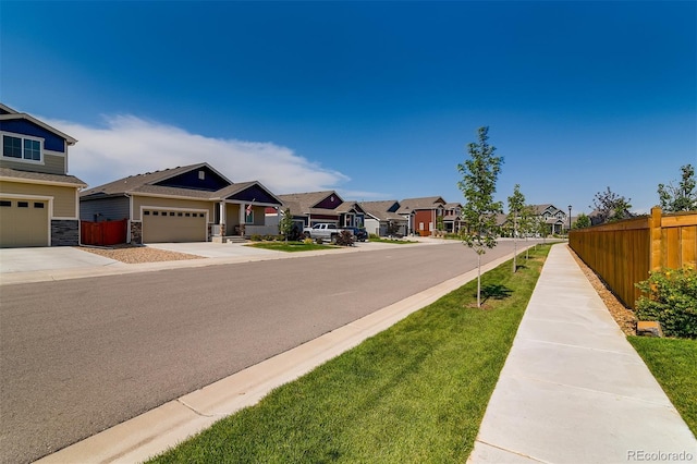1057 Long Meadows St, Severance, CO 80550 - view of asphalt street featuring a residential view and sidewalks