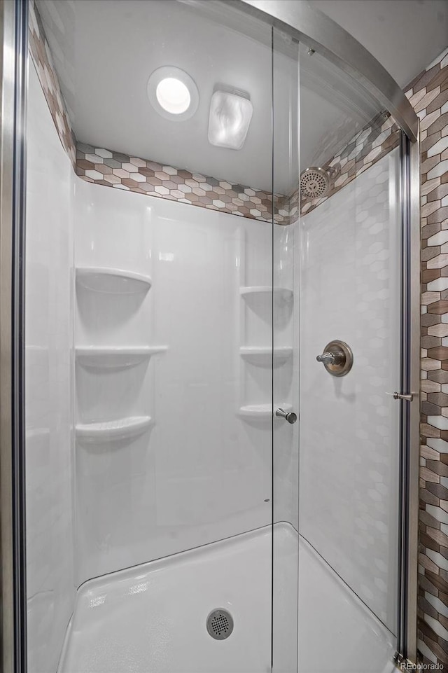 bathroom featuring walk in shower