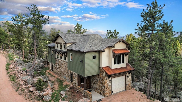 view of front of property with a garage