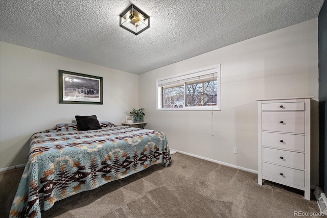 carpeted bedroom featuring a textured ceiling