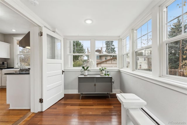 sunroom featuring plenty of natural light