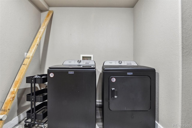 laundry area featuring laundry area and washing machine and dryer