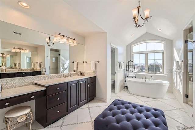 full bathroom featuring vaulted ceiling, plus walk in shower, vanity, a notable chandelier, and toilet