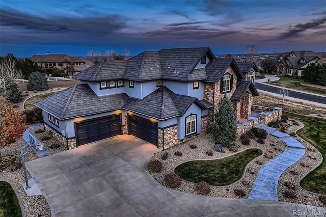 view of front of property with a garage