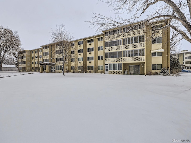 view of snow covered building